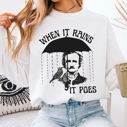 When It Rains It Poes Sweatshirt White / S Sweatshirt The Mystic Eden Bookish Book Lovers